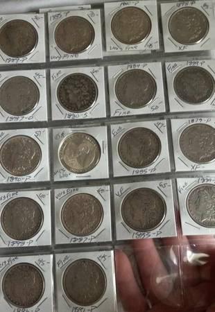 silver coin collection of Morgans, Peace dollars, and .999 silver