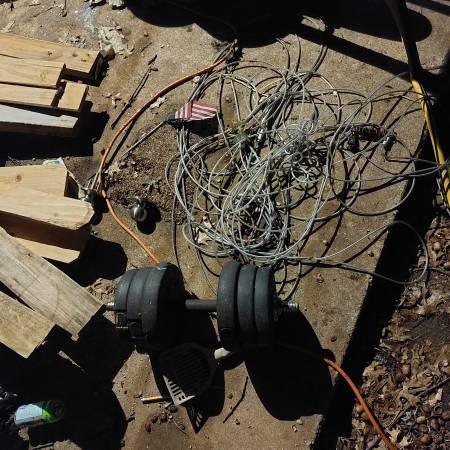 100 ft plus of plastic rubber coated steel cable with connections