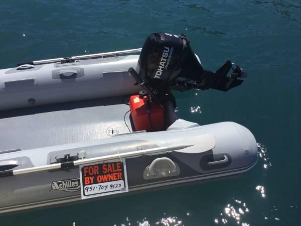 Achilles inflatable with Tohatsu outboard