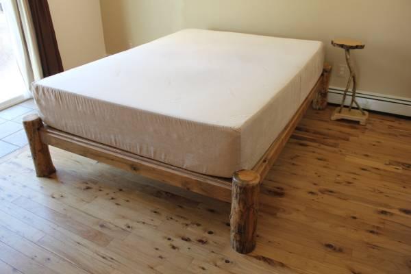 Custom-built beetle-kill pine platform bed, queen size
