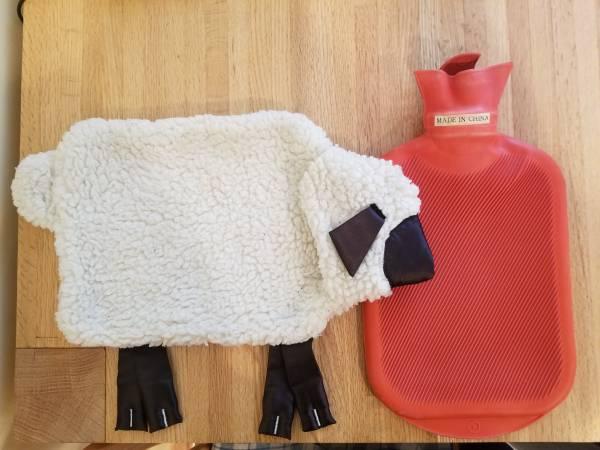 Hot water bladder and sheep cover