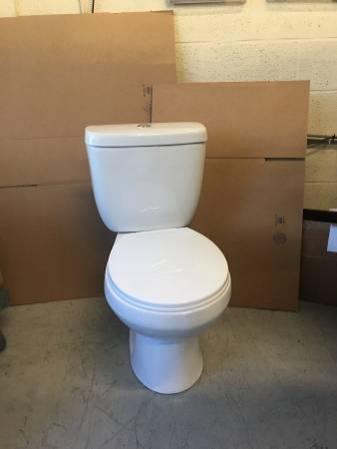 Band in still in Box 2 stage top dual flush Toilet Bowl ((I have 30))