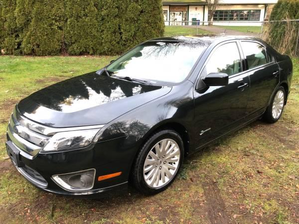 2010 FORD FUSION HYBRID Auto ONLY 75K miles. LOADED. WARRANTY INCLUDED
