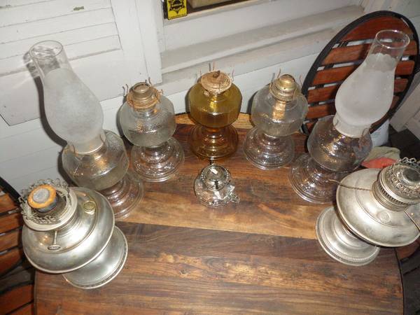 8 antique hurricane lamps & large brass lantern