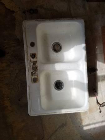 Cast Iron Sink and a bathroom sink