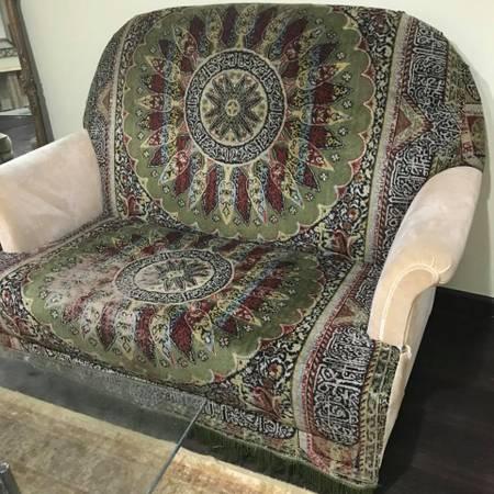 Loveseat custom made with a Persian/ Arabian rug