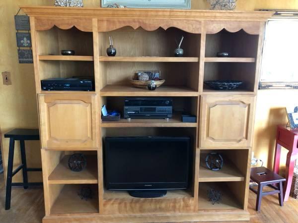 Preowned solid birch wood entertainment center/media console/bookcase.
