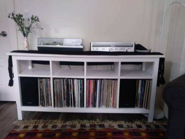 White wooden console table (great for storing vinyl)