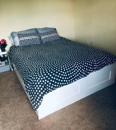 Like New Queen Bed + Mattress + 4 Storage Drawers - Available in July