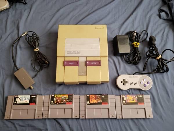 Super Nintendo with Donkey Kong Country 2 and 3 more games for $70 OBO