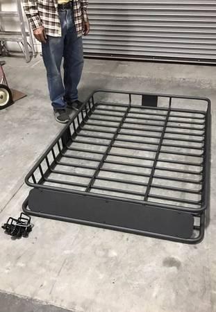 New in box large 64x45x7 inches tall roof travel cargo carrier storage