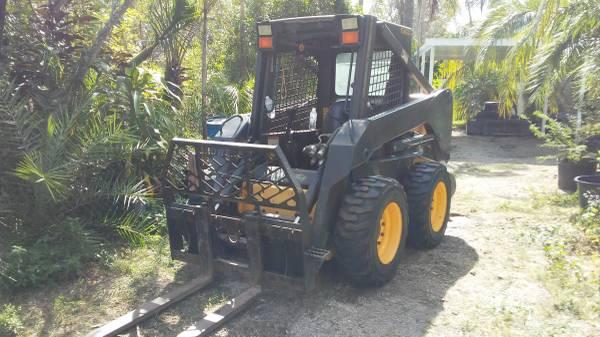 2006 New Holland LS 170 skid steer with high flow