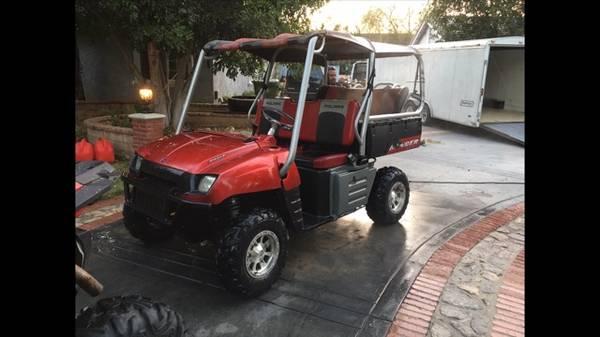 2007 Polaris Ranger 700XP 6 seater , with custom cage. Trade for ?