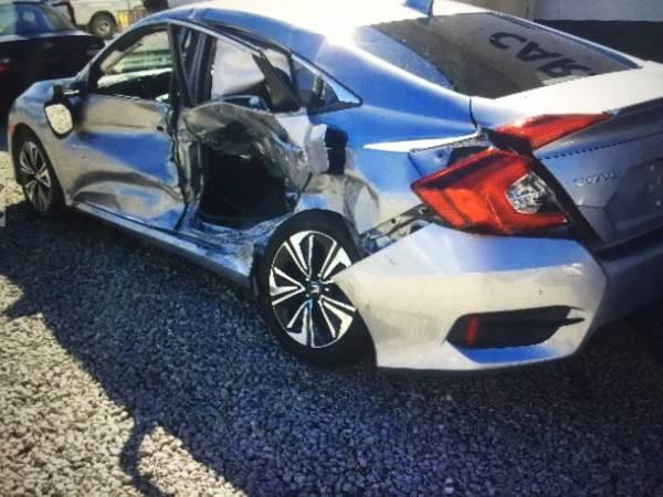 2017 Honda civic EX. driver side doors damage,
