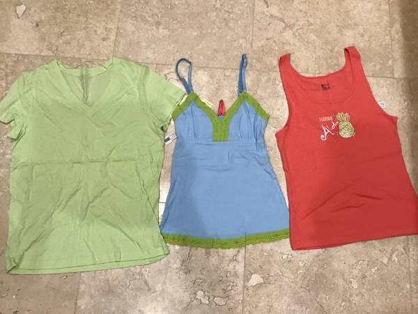 Three brand new with tags womenâs shirts retail $38ea buy 2 get 1 free